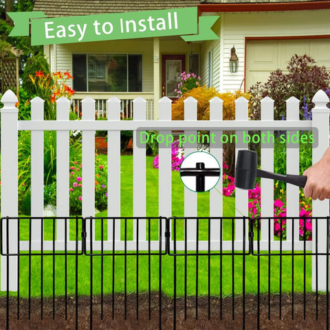 10 Pack No Dig Animal Barrier Fence For Gardens And Yards Rustproof Metal Bottom Blocker Border Fence Seventeen Inch High And 10Ft Long Decorative Outdoor Fence shown installed in front of a white picket fence with a mallet in hand.