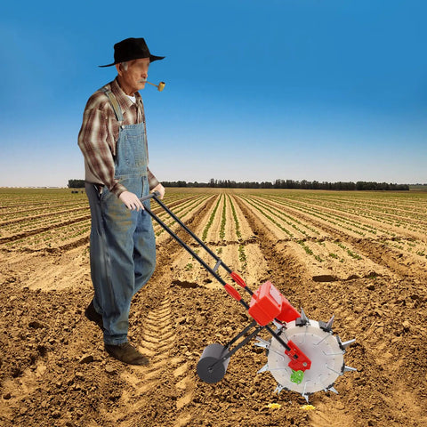 Farmer using Hand Push Seeder With Ten Nozzles For Garden Row Crops, Precision Seed Drill Planter, in a large field
