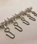Ceiling Curtain Track Gliders Set Pack Of 10 with plastic body and steel hooks on smooth rolling wheels for ceiling rails