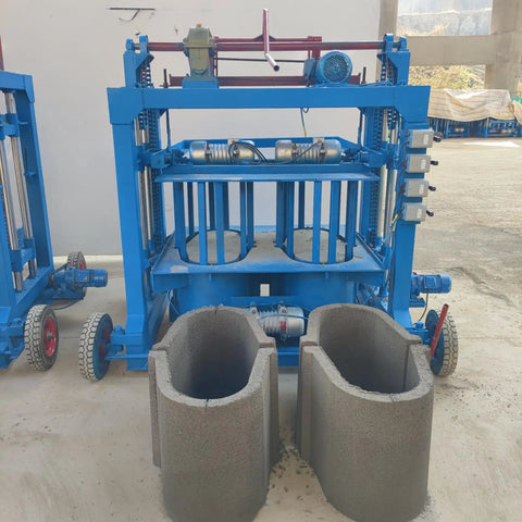 Industrial Brick Making Machine And Cement Block Production Equipment For Workshops Featuring Hella Solid Hydraulics with molded concrete blocks.