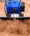 46Cc Four Cycle Gas Powered Rototiller Cultivator with 16 Inch Heavy Duty Steel Tines working on soil, blue finish visible