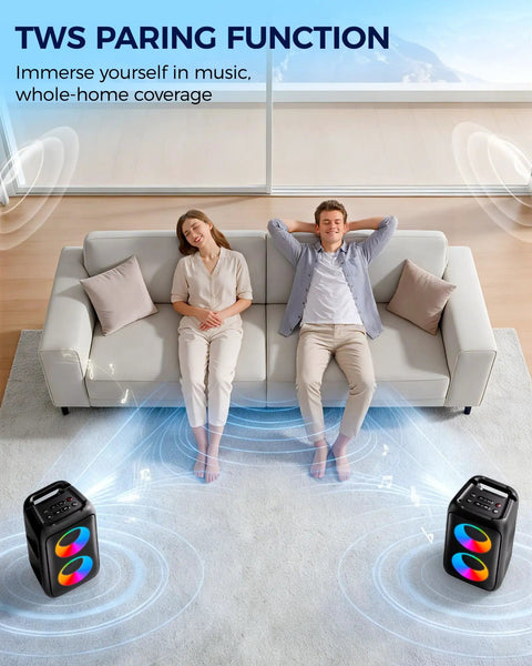 Two people relaxing on a sofa with Bluetooth Party Speaker With Colorful Lights on both sides, showing TWS pairing function.
