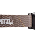 Close-up of brown headband on Compact 350 Lumen Headlamp With Red Night Vision Three White Modes Strobe Battery Indicator For Hiking