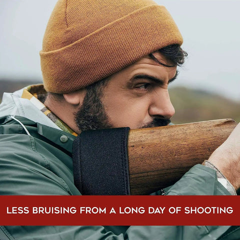 Man using Gel Recoil Pad For Shotgun With Slip On Rifle Stock Pad Softens The Kick Using Visco Elastic Gel on wooden stock.