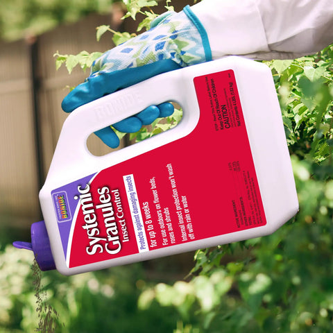 Person applying Insect Control Systemic Granules Ready To Use No Fuss Water Resistant Long Lasting Outdoor Protection