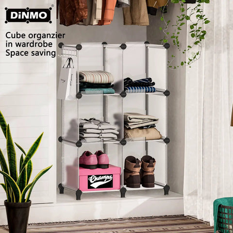 Sixteen Cube Storage Organizer Bookcase Display Shelf with clothes and shoes in wardrobe