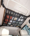 Upgrade Car Ceiling Cargo Net Pocket 31.5x21.6 Double Layer Roof Storage Organizer installed in SUV interior with items
