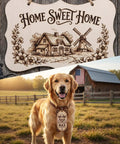 Wooden "Home Sweet Home" sign with farmhouse and windmill engraving above a golden retriever with engraved collar in front of barn.