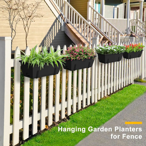 Heavy Duty Black Balcony Rail Planters 16.9 Inch Deck Flower Boxes with flowers on a white fence in a garden setting.