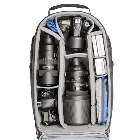 Streetwalker Rolling Camera Backpack With Dedicated Laptop Pocket And Minimalist Black Exterior, Hidden Zip Opening For Main Compartment When Not In Use, Durable, Travel Ready For Photographers On The Go showing organized camera storage compartments