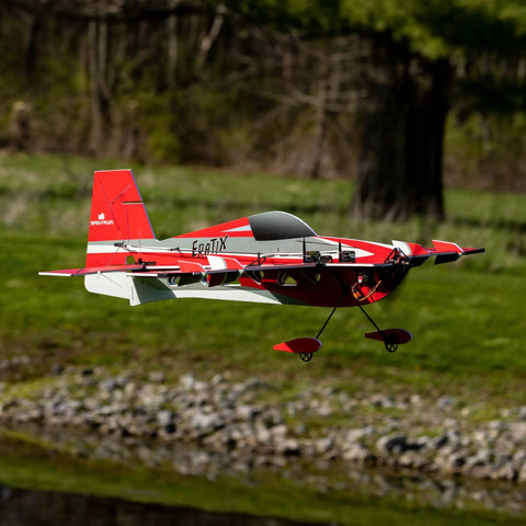 Eratix 3D Flat Foamy 860mm Ready To Fly RC Airplane With Brushless Motor Spektrum Avian Smart ESC in flight outdoors