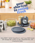 5 In 1 Kitchen Prep And Storage Bowl System Featuring Crinkle Slice And Shred Blades For Real Deal Meal Prep And Hosting Like A Champ With Secure Snap Lids on kitchen counter with bowls and processor.
