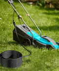 Coiled Long Reach 200ft Heavy Duty Extension Cord 16 AWG 3 Prong SJTW Power Cable connected to electric lawn mower