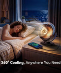 Tough Golf Cart Fan With Rock Solid Magnet And Dual Strap 12000Mah Battery on nightstand beside sleeping person.