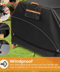 All Weather 6 Ft Picnic Table Cover With Waterproof 420D Oxford Cloth Heavy Duty Windproof UV Protection Adjustable Straps And Air Vent Fits 70 And 72 Inch Outdoor Tables Black, shown with securing straps and windproof clips.