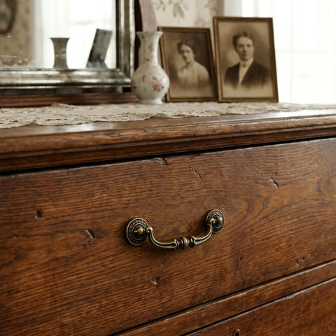 Six Pack Antique Brass Drop Bail Pulls For Furniture Standard Three And A Half Inch Center To Center Cabinet Handles Four Point Six Inch Overall Length Easy Install Vintage Style Pulls For Dresser Chest And Drawers on wooden dresser.