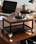 Hassle Free Mount Heavy Duty Brown Mini Caster Wheels With M4X15 Screws on a wooden office table with coffee set.