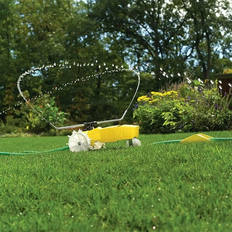 Traveling Sprinkler That Rolls Across Large Lawns Up To 13,500 Sq Ft Cast Iron Outdoor Water Sprinkler For Yard And Garden With Auto Shut Off And Adjustable Spray Arms In Bright Yellow.