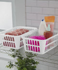 White Plastic Storage Baskets Set Of 48 For Grab And Go Organization on wire shelf holding towels and toiletries