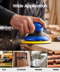 Pro Grade 5 Inch Random Orbital Palm Sander Built As A Smooth Operator Delivers Rock Solid 12000 Rpm Performance For Flawless Wood And Auto Body Finishing Crush Every Project Today shown in use on wood, ideal for furniture, cars, marble, and metal.