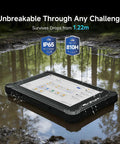 Heavy Duty Rugged Android 14 Tablet With Built In Barcode Scanner 8GB RAM And 128GB Storage resting on water surface, showcasing durability.