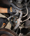 Mechanic using 16 Piece Reversible Ratcheting Combination Wrench Set Metric With Flush Mounted Reversing Lever for car repair
