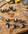 Stainless Steel M8 Adjustable Furniture Leg Levelers Set With Screw In Feet And Nylon Base shown on a workshop table