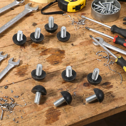 Stainless Steel M8 Adjustable Furniture Leg Levelers Set With Screw In Feet And Nylon Base shown on a workshop table