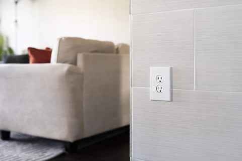 UltraPro Duplex Heavy Duty Wall Outlet With Reinforced Yoke And Self Grounding Clip 3 Prong 15A White UL Listed Receptacle installed in living room wall
