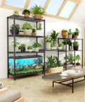 Beefy 3 Tier Wire Shelving Unit With 1200 Lbs Total Capacity And 400 Lbs Per Shelf, holding plants and aquarium in sunlit room.