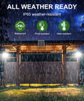 Set It And Forget It 200W Solar Flood Light Outdoor illuminating barn in heavy rain with IP65 weather resistance features