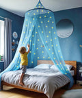 Glow In The Dark Stars Canopy Bed For Girls With Galaxy Lights And Princess Net Tent, boy reaching under dreamy blue canopy