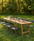 Outdoor dining setup with Folding Chairs Sets Of 10 330 Lb Capacity Plastic Stackable Portable Patio Dining Set
