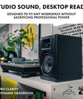 BX5BT 5 Inch Desktop Studio Monitor Speaker on desk with turntable, showcasing DSP and Bluetooth app control, ideal for small rooms.