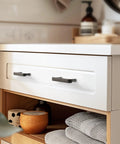 Weathered Nickel Cabinet Pulls, 5 Inch Length, 128mm Screw Spacing, 10 Pack installed on white cabinet front view
