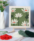 Four Sets Punch Needle Kit With 10x10 Frames For Beginners displayed with lotus pattern and yarns
