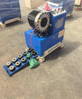 Tough As Nails Electric Hose Crimper And Hydraulic Pipe Press With Forged Steel Head 3600Kn Force 10 Die Sets 220V Power Professional Workhorse For Job Site Setup, showing blue machine with various die sets.