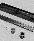 24 Inch Linear Shower Drain With Removable Square Pattern Grate Matte Black Stainless Steel Includes Hair Strainer No Mess No Fuss Easy Clean Built To Last Design Fits Standard 2 Inch PVC ABS Or Cast Iron Drain Bases components displayed
