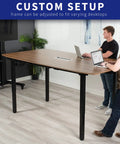 Heavy Duty VIVO 4 Leg Black Electric Dual Motor Standing Desk Frame For 60-130 Inch Tops, Solid height adjustable desk setup with users.