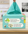 Person takes blue cloth from box labeled Ultra Soft Microfiber Cleaning Cloths 8 By 8 Inches 40 Pack Lint Free Rags In A Sturdy Box