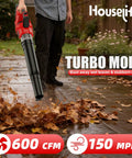Man using 600 CFM Cordless Leaf Blower With 18V M18 Battery Compatibility, 150 MPH Turbo Power Ultra Lightweight Handheld Blower For Lawn Care And Driveway Cleanup, Tool Only Battery And Charger Not Included to clear leaves.