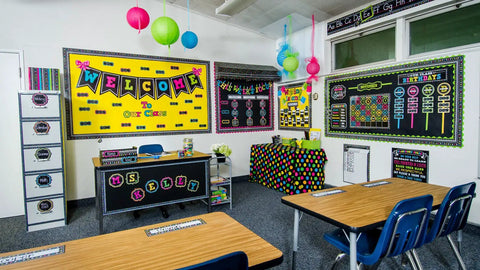 Colorful classroom setup with Chalkboard Brights Name Plates For Classrooms, Extra Long And Sturdy, 36 Per Pack on desks.