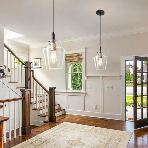 Modern Black And Gold Glass Pendant Light 2 Pack With Adjustable Height Cord For Kitchen Island Clear Round Shade E26 Socket hanging in a stylish entryway.