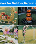 Outdoor decoration with garden stakes featuring a reindeer sleigh, pumpkin stack, balloon displays, and flower arch
