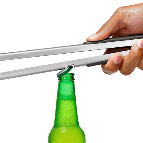 Stainless steel tongs with built-in bottle opener from Three Piece Grilling Tool Set With Stainless Steel Turner Scalloped Tongs And Silicone Tool Rest.