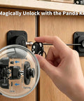 Hand using panda key to unlock two pack magnetic cabinet lock with childproof fridge and cabinets, easy no drill installation