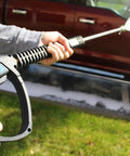 Person using SG28 Spray Gun With Easy Hold Tech For Pressure Washers, Italian Made Shockproof Ribbed Body, washing a vehicle