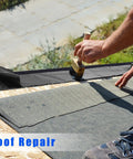 Hand applying waterproof patch with Two Rolls Of 1.97 Inch Asphalt Crack Filler Tape for driveway repair and joint sealing on roof.