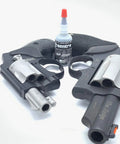 BP2000 Dry Powder Lubricant For Triggers Bores Bolts And Slides 0.1 oz bottle next to revolvers, reduces friction