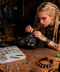 Person using Dope Punk Spikes And Studs Kit With 500 Sets In 11 Sizes For Jackets Shoes Belts Bags And Leather Craft DIY Accessories